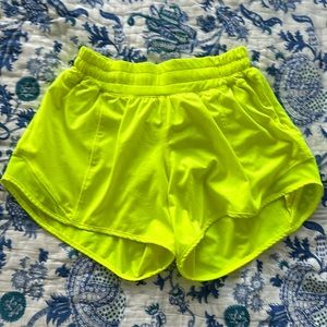 Electric yellow shorts from Lululemon in size 4.
